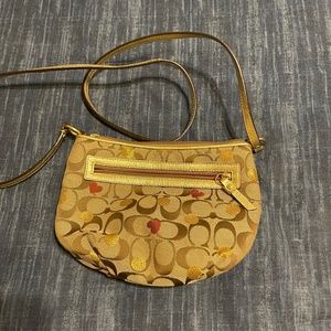 Coach crossbody with strap 9" wide X 7" deep at center